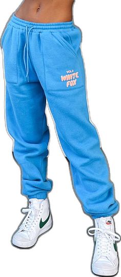 Winter Cotton Tracksuit With Side Pockets, Blue Sweats With Elastic Waistband For Winter, Blue Winter Sweats With Elastic Waistband, Blue Sweats With Elastic Waistband, Blue Sweats With Elastic Waistband For Leisure, Casual Blue Cotton Tracksuit, Casual Fleece Tracksuit With Pockets, Sporty Blue Joggers With Drawstring, Sporty Blue Sweatpants With Drawstring