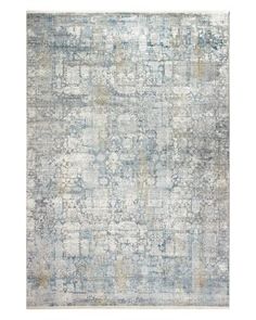 an area rug with blue and grey colors