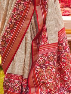 Introducing our stunning grey patola printed silk wedding wear saree with a blouse, a perfect blend of traditional elegance and modern sophistication. This saree is made of high-quality silk material, known for its luxurious texture and smooth drape. The grey color of the saree exudes a charming and traditional look, making it an ideal choice for weddings and festive occasions.
The saree features exquisite patola printed work, adding a touch of artistry to its design. Patola prints are highly so Ethnic Looks, Silk Material, Traditional Sarees, Wedding Wear, Saree Wedding, Timeless Classic, Festival Wear, V Shape, Silk Fabric