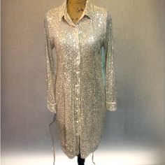 Cream Color And Silver Sequence Dress Satin Buttons. Buttons In The Front With Straight Collar And Long Sleeves Brand New The Length From Shoulders To Hem Line Is Almost 2.5’ I’m 5’3” So It Would Go To About 3.5” Past My Knees Depending On Your Bust Line. Silver Long Sleeve Sequined Dress, Silver Sparkling Long Sleeve Dress, Elegant Silver Dress With Shine, Silver Long Sleeve Dresses For Festive Occasions, Sequence Dress, Dress Satin, Cream Dress, Cream Color, Colorful Dresses