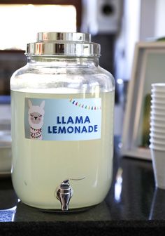 a jar with a label on it sitting on a counter