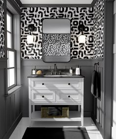 a white bathroom with black and white wallpaper on the walls, sink and mirror