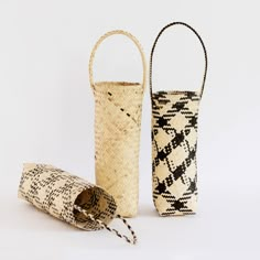 three different types of baskets are shown in this image, one is made from straw and the other has a woven handle