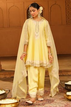 Lemon yellow silk chanderi short anarkali with kashmiri tilla and parsi gara embroidery. Comes with satin silk salwar and a silk organza dupatta. - Aza Fashions Yellow Chanderi Lawn Suit For Diwali, Semi-stitched Yellow Chanderi Lawn Suit, Yellow Semi-stitched Chanderi Lawn Suit, Unstitched Yellow Silk Lawn Suit, Yellow Unstitched Silk Lawn Suit, Yellow Anarkali Set With Chikankari Embroidery For Eid, Yellow Silk Lawn Suit With Dupatta, Yellow Chikankari Anarkali Set For Eid, Elegant Yellow Chinon Salwar Kameez