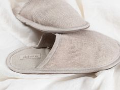 Slip into these cozy slippers and make the home being time even more pleasant. Made from natural fabrics, among which includes natural linen blend and leather which ensures quality and comfort. Made in a beige color. The leather sole ensures that the slippers are non-slip while the interior linen fabric makes them breathable.  These are the perfect indoor slippers, with the cozy upper part, lightweight insole with cushioning, designed to feel comfortable. A great choice for home use, while trave Beige Cushioned Slippers For Indoor Use, Cream Slip-on Slippers For Indoor Use, Cream Slip-on Indoor Slippers, Casual Beige Slippers With Soft Sole, Indoor Beige Slippers With Textured Footbed, Comfortable Beige Indoor Slippers, Beige Indoor Slippers, Beige Textured Indoor Slippers, Beige Slip-on Slippers With Textured Footbed