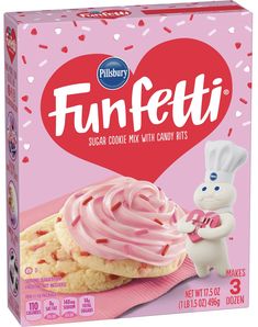 a box of funfetti cookies with pink frosting and sprinkles