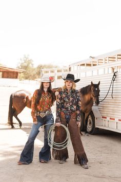 Jazz up your classic Western shirt with roses, lucky horseshoes, and a splash of burnt orange. This button-up top mixes good fortune with pearl snaps and signature Western smile pockets for a standout cowgirl look. Gold and Brown Print Collared Button Up Pearl Snaps Buttons True to Size Size up if Busty 52% Viscose 48% Rayon Cowgirl Look, In Icon, Concho Belt, Glad Rags, Lucky Horseshoe, Wild Rag, Cow Girl, Western Shirt, Vintage Western