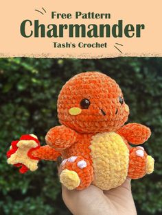 a hand holding a small orange crocheted teddy bear with the text free pattern charmader