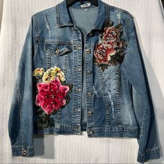 - Size Medium Misses - Lightly Distressed Jacket With Floral Appliques And Beaded Details - Buttoned Front - Chest Pocket - Cotton, & Elastane Material - Machine Washable - Medium Wash Denim - Shoulder Length Is 19” - Jacket Length Is 23” Never Worn And Looks New! Comes From A Smoke Free Home! Denim Floral Print Long Sleeve Outerwear, Fitted Pink Denim Jacket With Long Sleeves, Fitted Floral Print Denim Jacket, Fitted Pink Outerwear With Floral Embroidery, Fitted Pink Denim Jacket For Spring, Pink Fitted Long Sleeve Denim Jacket, Multicolor Floral Embroidered Spring Outerwear, Spring Multicolor Floral Embroidered Outerwear, Pink Outerwear With Floral Embroidery For Fall