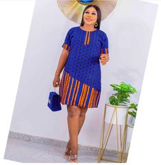 Made to order with African fabric. Has a zipper closure at the back. Measurements needed. *Bust cm/inches *Waist *Hip *Height Blue Knee-length Mini Dress With Back Zipper, African Dress Short, Short African Dress, Dress African Print, Ankara Short, Dress Ankara, Yellow Gown, African Print Dress Ankara, African Styles