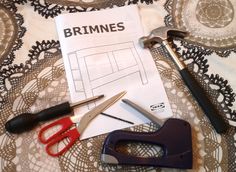 some tools are laying on top of a piece of paper with the words brimnes