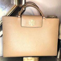 Tory Burch Britten Tan Pebbled Leather Satchel. Stunning Large Tote With Three Interior Compartments. Room For Laptop In Padded Center. Excellent Condition. Tory Burch Bags, Laptop Bags, Tory Burch Bag, Large Tote, Leather Satchel, Pebbled Leather, Laptop Bag, Tory Burch, Satchel