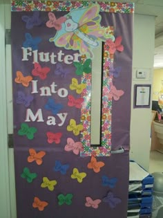 a bulletin board that says flutterr into may with butterflies on the front and back