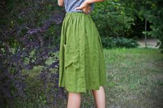 MIA linen elastic waist skirt have 2 pockets on front. Those skirts are knee length, will look elegant wearing in summer. Washed linen is soft and will keep you cool in hot summer days. Color in picture: Olive Green Combined in pictures with EVA Shadow Gray top --------SIZING GUIDE BODY-------- SIZE XS Chest 84 cm / 33.1 in Waist 68 cm / 26.8 in Hip 92 cm / 36.2 in SIZE S Chest 88 cm / 34.6 in Waist 72 cm / 28.3 in Hip 96 cm /37.8 in SIZE M Chest 92 cm / 36.2 in Waist 76 cm / 29.9 in Hip 100 cm Summer Bottoms With Pockets And Relaxed Fit, Summer Skirt With Slip Pockets, Relaxed Summer Skirt With Slip Pockets, Summer Relaxed Skirt With Slip Pockets, Summer Cotton Skirt With Pockets, Summer Solid Skirt With Side Pockets, Solid Color Summer Skirt With Side Pockets, Linen Skirted Bottoms With Pockets, Skirted Linen Bottoms With Pockets