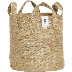 a jute basket with rope handles on the front and bottom, shown in natural colors