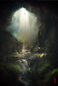 the light shines in from an opening into a cave filled with water and greenery