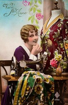 a woman sitting at a sewing machine next to a dress