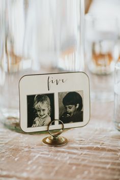 a photo frame sitting on top of a table