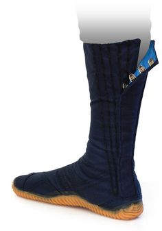 a pair of blue boots with zippers on them