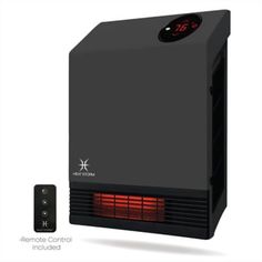 an electric heater with thermometer and remote control next to it on a white background