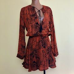 Nwt, Karina Grimaldi Mini Dress Or Can Be Worn As A Tunic With Pants, Leggings, Thigh High Boots Tiered Back With Gathered Waist Or Can Be Worn On Hips A Wonderful Summer Wedding Guest Dress! This Is A Roomy Xs. It Fits More Like A Small Rust Orange Colored Georgette Snake Pattern With Black Tassel Ties A Versatile And All Year Round Dress Or Tunic Top Black Lined A Perfect, Lightweight Travel Piece Bohemian Tie Waist Dress For Fall, Bohemian Fall Dress With Tie Waist, Fall Bohemian Dress With Tie Waist, Printed Dresses For Date Night In Fall, Printed Dresses For Fall Date Night, Printed Fall Dresses For Date Night, Orange Printed Party Dress, Orange Printed Mini Dress, Orange Long Sleeve Dress For Night Out