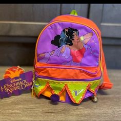 Vintage Disney Esmeralda From The Hunchback Of Notre Dame Mini Backpack 7in Wide 8.75in Height 4in Depth Brand New Will Come With Original Wrapping Disney Themed Multicolor Bags For Fan Events, Themed Multicolor Bags For Disney Fan Events, Disney Character Style Backpack, Disney Green Backpack, Green Disney Backpack, Character Style Backpack For Disney Fan Events, Disney-themed Character Backpack, Character Backpacks For Disney Trips, Multicolor Disney Standard Backpack