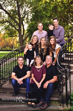 a family posing for a photo on the steps