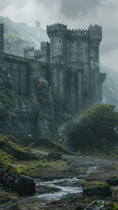 an old castle sits on the side of a mountain with moss growing around it's sides