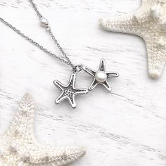 Starfish Hidden Pearl Necklace displayed on a white wooden surface. Starfish Design, Ocean Inspired Jewelry, Starfish Earrings, Stunning Necklace, Ocean Inspiration, Crystal Pearls, Cable Chain, Starfish, The Ocean