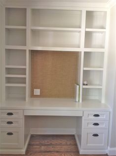 a white desk with two drawers and a book shelf