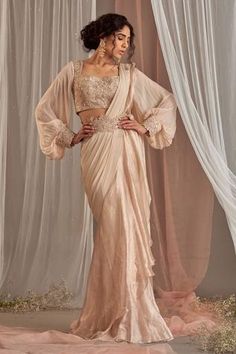 Shop for Nidhika Shekhar Pink Crepe Ruffle Pre-draped Saree With Blouse for Women Online at Aza Fashions Puff Blouse, Ruffle Saree, Crepe Saree, Rose Champagne, Drape Saree, Ready To Wear Saree, Indian Wedding Wear, Balloon Sleeve Blouse, Blouse For Women