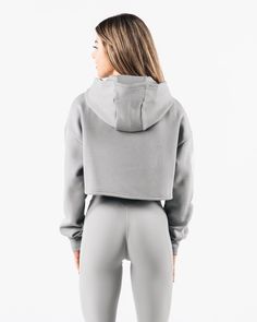 HIGHLIGHTS. Double-brushed fleece inside. Drop shoulder style. Puff print branding at back and sleeves FIT SUGGESTION. This item runs true to Alphalete’s relaxed fit.. If you are between sizes, we recommend sizing up. Model is 5’2”/157.5cm, wearing a size XS with a 34.5”/87.6cm bust.. MATERIALS AND WASHING DIRECTIONS 55% Cotton, 45%. Polyester.. We recommend washing inside-out on a cold setting. Hang to dry Created using proprietary fabric treatments, the Performance Hoodie material has an amazi Print Branding, Puff Print, Hip Hip, Crop Hoodie, Ombre Effect, Hoodie Material, Womens Bras, Grey Hoodie, Cropped Hoodie