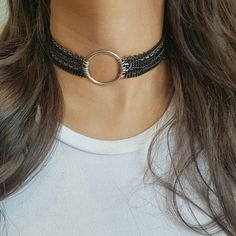 "♦ A silver chain choker, made of silver-plated brass in a Very high quality, The chain is made up of rows of silver and black chains with an O-Ring pendant decorating its center. SIZE Length: 11.8\" (30cm) up to 15.8\"(40cm) hoop size: 1.37\"(3.5cm) Pendant width: 1.37\"(3.5cm) ♦ This piece of jewelry is perfect as a gift for yourself, for a wedding day, Valentine's day or a birthday. If you're interested in sending a gift to a third party, just write your message to the recipient and I will do Thick Black Choker, Silver Layer Necklace, Rocker Jewelry, O Ring Choker, Beautiful Chokers, Multi Chain Necklace, Silver Choker Necklace, Layered Necklaces Silver, Layered Chokers