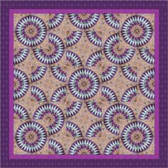 a purple and blue quilt with circular designs on it, in the center is an image of