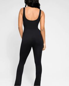 Black Seamless Snatching Flare Jumpsuit   | Veronica Luxe Black Stretch Jumpsuits And Rompers In Elastane, Black Sleeveless Elastane Jumpsuits And Rompers, Black Stretch Jumpsuits And Rompers With Seamless Construction, Sleek Black Stretch Jumpsuits And Rompers, Sleek Sleeveless High-stretch Jumpsuits And Rompers, Black High Stretch Seamless Jumpsuits And Rompers, Sleek Black Elastane Jumpsuits And Rompers, Sleek Sleeveless Stretch Jumpsuits And Rompers, Black Sleeveless Unitard For Night Out