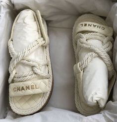 Chanel Cord & Lambskin Sandals (Ivory) SS20Unworn & 100% authentic guaranteed. Supplied in its original packaging. DETAILSIvoryCord & Lambskin quilted leatherMade in Italy Can't find your size? Use our Sourcery service or chat to a member of our team via WhatsApp Chanel Fabric, Mule Slides, Dad Sandals, Chanel Pearl, Chanel Sandals, Fashion Buyer, Carrie Bradshaw, Global Style, Chic Handbags