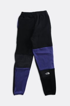 2.0 Patchwork North Face fleece pants featuring additional patchwork style lines. Recycled from 3 vintage jackets with an adjustable elastic pull tab waist. Sourced and reworked in CanadaMeasurementsSize: Women's XSCondition: Good vintage conditionColour: Purple blue and black Fleece Pants Women, North Face Fleece, Fleece Pants, Vintage Jackets, Blue And Black, Vintage Jacket, Pull Tab, North Face, Blue And Purple