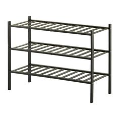 a metal shelf with three shelves on each side and one shelf below the bottom rack