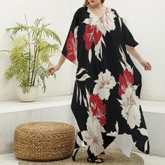 Indulge in elegance and comfort with our V-Neck Kimono Dress, a luxurious addition to your lounge and sleepwear collection.  Crafted from imitation silk (97% polyester and 3% spandex), this robe drapes beautifully and feels incredibly soft against the skin.  The regular fit silhouette ensures a comfortable and flattering wear, while the V-neck adds a touch of sophistication.  Perfect for lounging at home or as a stylish cover-up, this kimono dress is a thoughtful gift for any woman who deserves Spring V-neck Lounging Dress, Elegant V-neck Sleepwear For Vacation, Black Summer Lounging Dresses, V-neck Spring Dresses For Home, Printed V-neck Maxi Dress For Daywear, Casual V-neck Kaftan For Loungewear, Casual V-neck Nightgown For Vacation, Elegant V-neck Nightgown For Lounging, Summer V-neck Kaftan For Home