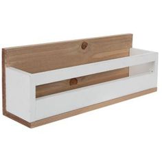 a white and wood shelf with drawers on the bottom, in front of a white background