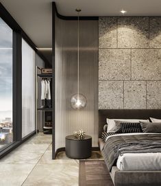 a bedroom with a large bed and floor to ceiling windows overlooking the cityscape