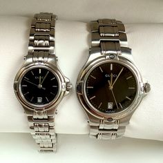 Authentic Gucci Stainless Steel Watches For Man And Woman. Nice Dressy Black Dials Pop Up Surrounded By Silver Case And Bracelet. Both Watches In Same Model, Both Looks So Dressy. Great For Casual Wear Or As A Dress Watch.Quartz Movements , Will Come With Newly Replaced Batteries . Ladies Band Fits Up To 6.5” Wrist,Mens Up To 6.8” Wrist. Pretty Good Condition, Great To Buy For Couple Gucci Formal Watches With Subdials, Modern Gucci Watch For Gift, Black Gucci Men's Watch, Modern Gucci Stainless Steel Watch, Gucci Watches With Metal Dial, Gucci Watch, Gucci Accessories, Stainless Steel Watch, Accessories Watches