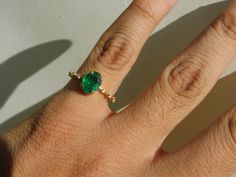 Mini Oval Emerald And Diamond Statement Ring In Gold / Anniversary Gift Ring / New Year Gift Ring / Best Gift For May Birthstone Lover / Surprised Your Love With This Beautifull May Birthstone Mini Emerald Ring  .....................-----------------------------------------------------------------------Item description - stone - natural emeraldshape - ovalsize - 5 mm width and 7 mm lengthweight - 1.10 caratscolour - rich green lustermaterial - 14k solid gold ( custom colour - white / rose / yell Emerald Ring Oval, Oval Emerald Ring Gift, Fine Jewelry Oval Cabochon Diamond Ring Gift, Oval Emerald Ring Fine Jewelry Gift, Oval Emerald Ring With Accent Stones For Gift, Emerald Oval Engagement Ring, Oval Emerald Engagement Ring, Emerald Ring Design, Oval Emerald Ring