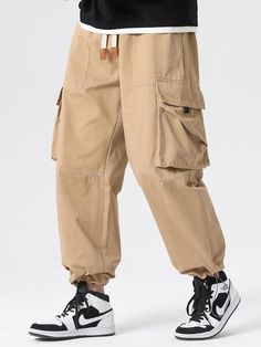 Experience the perfect blend of comfort and style with our Drawstring Cuff Parachute Cargo Pants. Made from high-quality cotton, these pants provide a soft and comfortable feel. The adjustable drawstring cuffs offer a personalized fit, while the multiple cargo pockets provide ample storage space. Enhance your casual ensemble effortlessly with this versatile piece. Specifications: Material: Cotton Package included: 1*Pants. Size Chart (inches): Size Waist Hip Length XS 27.6 44.1 38.6 S 29.1 45.7 Parachute Cargo Pants, Parachute Cargo, Paisley Shorts, Mens Swim Trunks, Beach Shorts, Boxer Shorts, Blue Waves, Man Swimming, Drawstring Pants