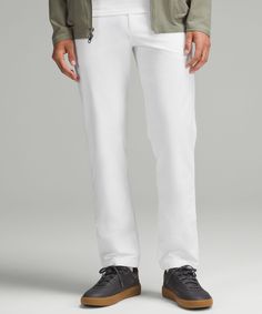 Welcome to the all-day comfort club. Previously known as the Commission Pant, we've removed the back-knee seam from these trousers for a more elevated look. Designed for Casual. You asked, we listened. Based on guest feedback, this classic fit still has a streamlined look from hip to hem, but now has a roomier feel in the glutes and thighs.:Our ABC technology uses an ergonomic gusset to remove tension from the crotch of our pants. Discreet zippered pocket on side seam. Back welt pockets with hidden snaps. Flip up the cuffs to reveal reflective details. This garment was treated with No-Stink Zinc to inhibit the growth of odour-causing bacteria on the fabric. Breathing Room, The Abc, Fitted Trousers, Leggings Shop, Mens Trousers, Welt Pockets, Long Tops, Short Tops, Stretch Cotton