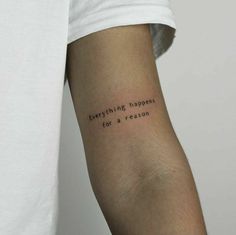 a person with a tattoo that says everything happens for a reason on their left arm