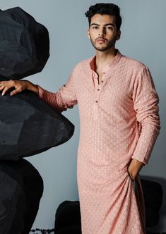 Resham work kurta set , paired with pants. Designer Peach Kurta With Chikankari Embroidery, Peach Straight Kurta With Zari Work, Bollywood Style Peach Kurta For Diwali, Peach Bollywood Kurta For Diwali, Unstitched Bollywood Peach Kurta, Unstitched Peach Bollywood Kurta, Designer Wear Straight Kurta In Peach, Bollywood Style Peach Kurta For Eid, Spring Orange Straight Kurta