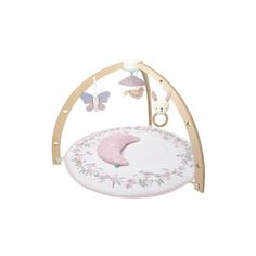 a pink and white baby bed with butterflies on it