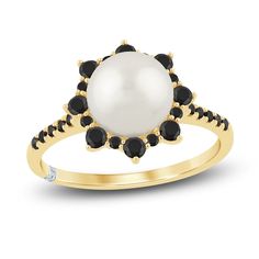 a pearl and black diamond ring