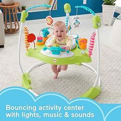 a baby sitting in a bouncer with music and sounds